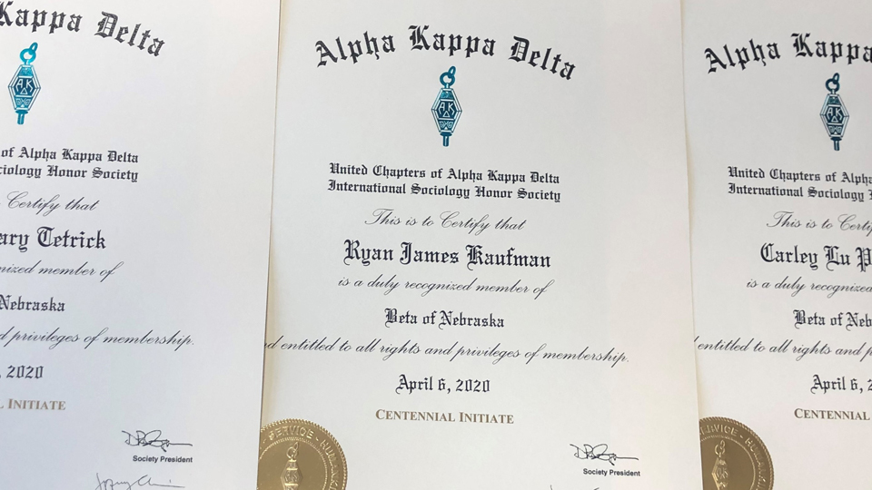 Photo Credit: Alpha Kappa Delta inductee certificates