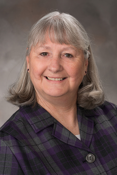 Dr. Helen Moore recieves Distinguished Contributions to Teaching award